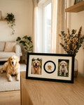 Matte black nose print frame with two golden retriever photos and a gold nose print on a sideboard